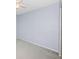 Bedroom with light blue walls, carpet and ceiling fan at 9101 86Th Ave, Seminole, FL 33777