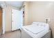 Laundry room with a washing machine and an open doorway at 9101 86Th Ave, Seminole, FL 33777