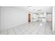 Open floor plan with tiled flooring throughout the living area and kitchen at 9101 86Th Ave, Seminole, FL 33777