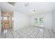 Bright living space with tiled floors and French doors leading to the outdoors at 9101 86Th Ave, Seminole, FL 33777