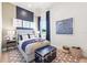 Charming bedroom with nautical decor and ample natural light at 10388 Sun Isle Dr, Englewood, FL 34223