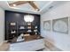 Office featuring custom shelving, stylish chandelier, and striking decor at 10388 Sun Isle Dr, Englewood, FL 34223