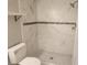 Updated bathroom features walk-in shower with decorative tile and new fixtures at 11715 Salmon Dr, Port Richey, FL 34668