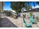 Backyard patio has outdoor seating, lush landscaping, and a relaxing ambiance at 13215 Beechberry Dr, Riverview, FL 33579