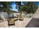 Outdoor patio boasts brick pavers, stylish seating, and a fire pit area perfect for entertaining and relaxing at 13215 Beechberry Dr, Riverview, FL 33579