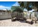 Cozy patio area featuring a unique pod-style sofa with umbrella and brick flooring for outdoor relaxation at 13215 Beechberry Dr, Riverview, FL 33579