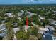 The home is located in a leafy neighborhood near waterfront access, the perfect combination of suburban and coastal living at 1431 Normandy Ln, Palm Harbor, FL 34683