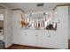 Dining area with built-in cabinets, countertop, and decor accents at 1431 Normandy Ln, Palm Harbor, FL 34683