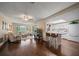 Bright living space with hard wood floors flowing into the kitchen at 1431 Normandy Ln, Palm Harbor, FL 34683