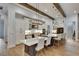 Open concept kitchen with a large island, modern appliances, and decorative lighting at 14421 Swiss Bridge Dr, Lithia, FL 33547