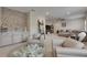 Inviting living area with a coffee bar, comfortable seating, and stylish decor, perfect for entertaining at 14421 Swiss Bridge Dr, Lithia, FL 33547