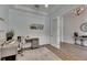 Stylish home office with neutral paint, modern furnishings, and wood-look flooring at 14421 Swiss Bridge Dr, Lithia, FL 33547