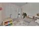 Playroom showcases storage, seating, and room to play at 14421 Swiss Bridge Dr, Lithia, FL 33547