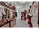 Spacious walk-in closet with custom shelving and racks for ample storage at 14421 Swiss Bridge Dr, Lithia, FL 33547