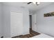 Bright bedroom with hardwood flooring and a closet at 1601 Fluorshire Dr, Brandon, FL 33511