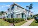 Charming townhome featuring a well-maintained exterior, lush landscaping, and a welcoming entrance at 1601 Fluorshire Dr, Brandon, FL 33511