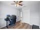 Bright home office with hardwood floors, ceiling fan and closet at 1601 Fluorshire Dr, Brandon, FL 33511