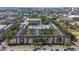 Community aerial view displaying property layout with city view and convenient parking garage access at 1810 E Palm Ave # 5114, Tampa, FL 33605
