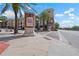 Exterior shot of The Quarter building with palm trees and street view at 1810 E Palm Ave # 5114, Tampa, FL 33605