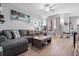 Comfortable living room featuring modern decor, a plush couch, and an inviting atmosphere with lots of light at 1810 E Palm Ave # 5114, Tampa, FL 33605