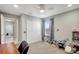 Well-organized bedroom featuring a double door closet, neutral walls, and toys at 1949 Parterre Ave, Lutz, FL 33558