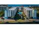 Beautiful condo building with pool and green area at 19531 Gulf Blvd # 604, Indian Shores, FL 33785