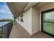 Balcony view with unit number, railing, and an expansive view of the water at 19531 Gulf Blvd # 604, Indian Shores, FL 33785