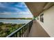 Scenic view from the balcony overlooking the water and lush greenery at 19531 Gulf Blvd # 604, Indian Shores, FL 33785