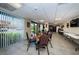 Cozy community room with tables and chairs, offering a relaxing space for gathering and socializing at 19531 Gulf Blvd # 604, Indian Shores, FL 33785