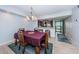 Bright dining room area with a view into the kitchen at 19531 Gulf Blvd # 604, Indian Shores, FL 33785