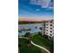 Beautiful waterfront condominium with lush landscaping and a boat dock at 19531 Gulf Blvd # 604, Indian Shores, FL 33785
