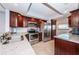 Modern kitchen with stainless steel appliances and granite countertops at 19531 Gulf Blvd # 604, Indian Shores, FL 33785