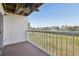 Private balcony offering views of the landscaped grounds and nearby buildings at 269 Madeira Cir, Tierra Verde, FL 33715