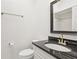 Bathroom features a granite vanity and shower with modern fixtures at 269 Madeira Cir, Tierra Verde, FL 33715