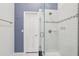 Modern bathroom showcasing a glass-enclosed shower with subway tile and stylish fixtures at 269 Madeira Cir, Tierra Verde, FL 33715