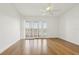 Bright bedroom with wood flooring and shuttered windows, ideal for relaxation and comfort at 269 Madeira Cir, Tierra Verde, FL 33715