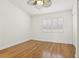 This room has hardwood flooring, fan and closet at 269 Madeira Cir, Tierra Verde, FL 33715