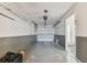 Spacious two-car garage with ample room for storage and organization at 269 Madeira Cir, Tierra Verde, FL 33715