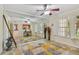 Bonus room with mirrored wall, large window, and access to the kitchen at 3261 Haviland Ct # 303, Palm Harbor, FL 34684