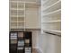 Walk-in closet with shelving, cubbies, and ample storage space at 3261 Haviland Ct # 303, Palm Harbor, FL 34684