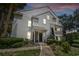 Charming condo featuring well-maintained landscaping and a welcoming entrance, perfect for comfortable living at 3261 Haviland Ct # 303, Palm Harbor, FL 34684