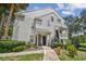 Charming condo featuring well-maintained landscaping and a welcoming entrance, perfect for comfortable living at 3261 Haviland Ct # 303, Palm Harbor, FL 34684