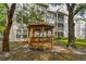 Wooden gazebo surrounded by trees at 3261 Haviland Ct # 303, Palm Harbor, FL 34684