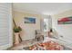 Cozy room with neutral walls, tile flooring, and decor at 3261 Haviland Ct # 303, Palm Harbor, FL 34684
