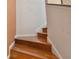 Bright staircase with wooden steps at 3261 Haviland Ct # 303, Palm Harbor, FL 34684