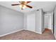 Bedroom with carpet, ceiling fan, closet and ensuite bathroom at 3281 Beneva Rd # 202, Sarasota, FL 34232