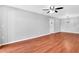 Open concept living space features hardwood floors and recessed lighting at 3281 Beneva Rd # 202, Sarasota, FL 34232