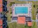 Overhead photo of a large pool with many lounge chairs for residents at 3281 Beneva Rd # 202, Sarasota, FL 34232