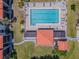 Aerial view of a community pool with several lounge chairs at 3281 Beneva Rd # 202, Sarasota, FL 34232