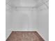 A walk-in closet equipped with white wire shelving at 3281 Beneva Rd # 202, Sarasota, FL 34232